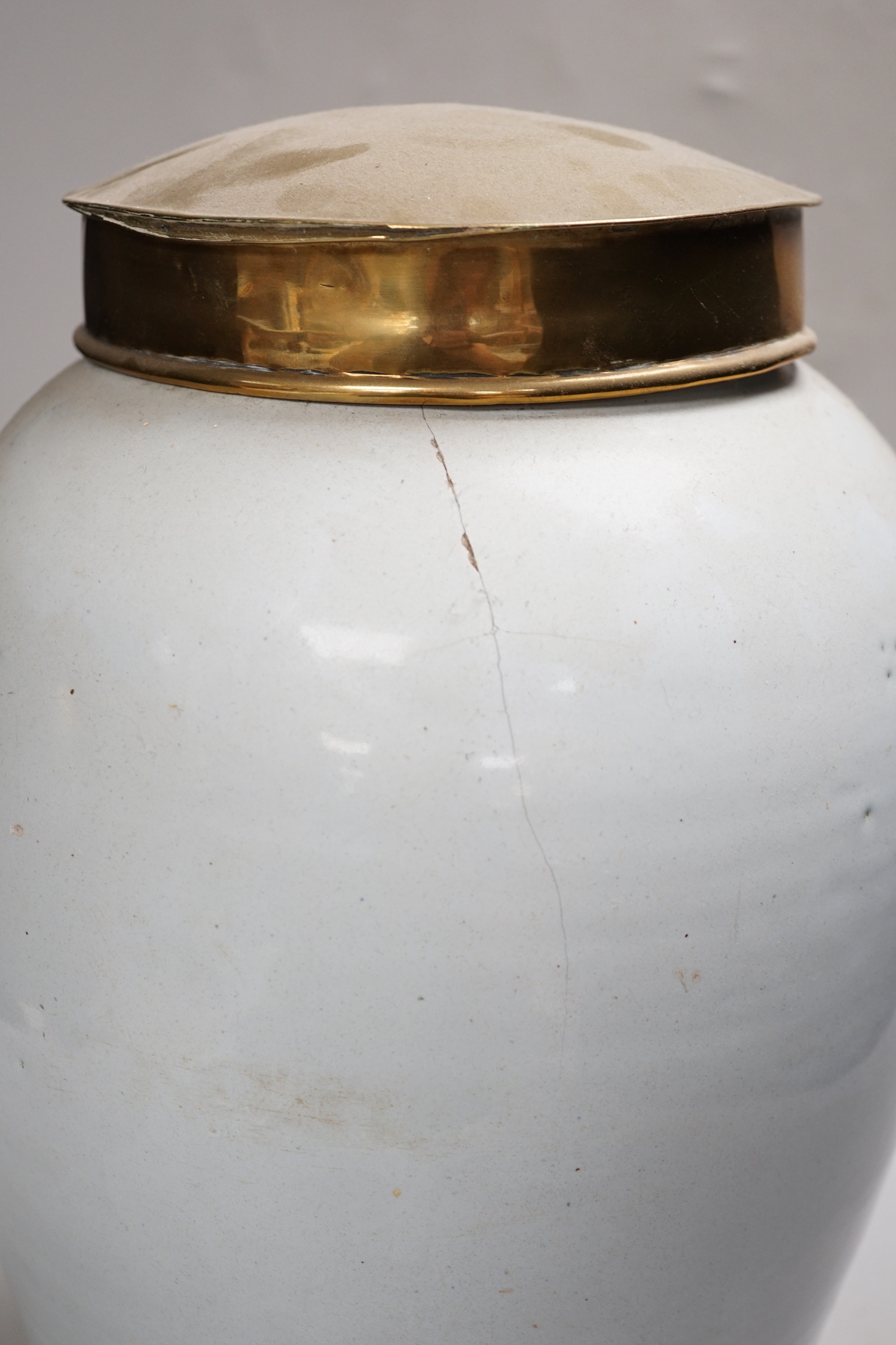 A mid 18th century Delft tobacco jar and brass cover, 36cm